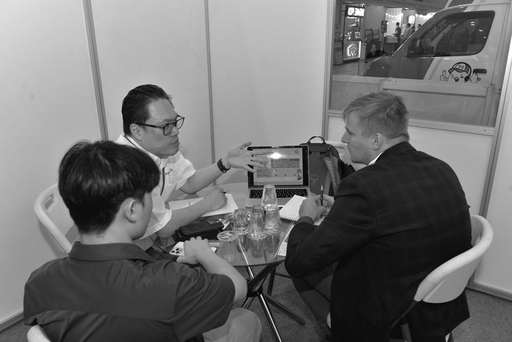 Professional sponsorship team discussing business opportunities
